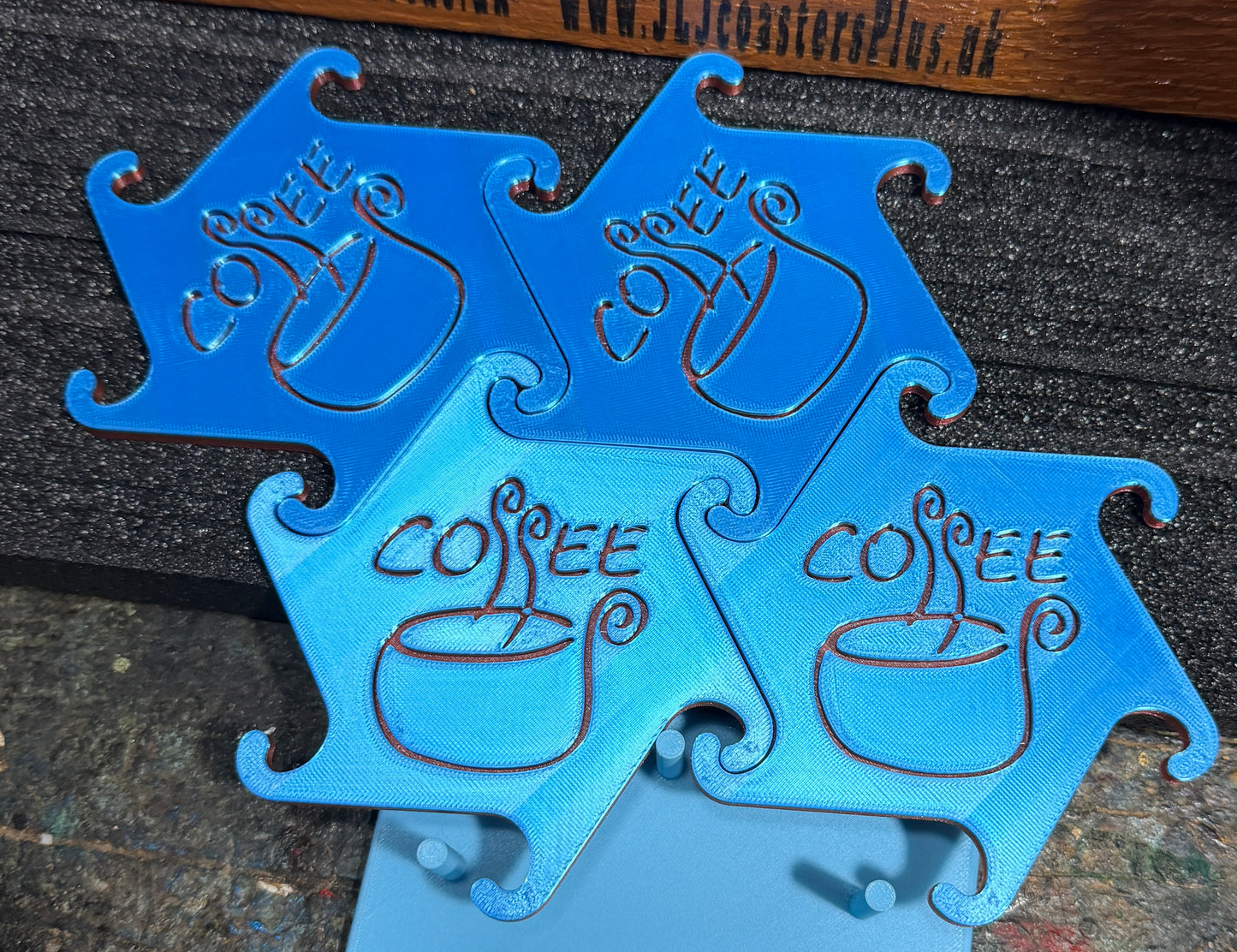 Interlock blue coffee coasters 3D printed x 4