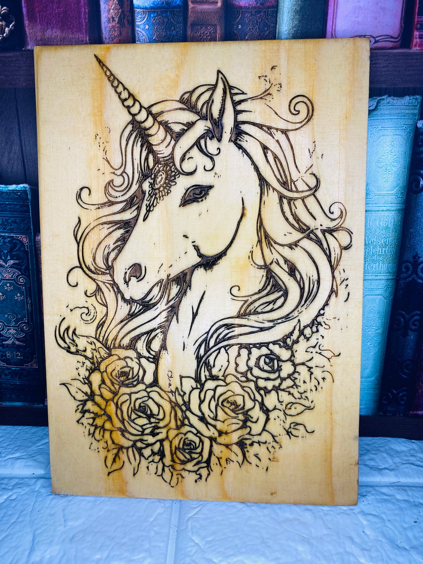 Unicorn laser engraved on upcycled wood