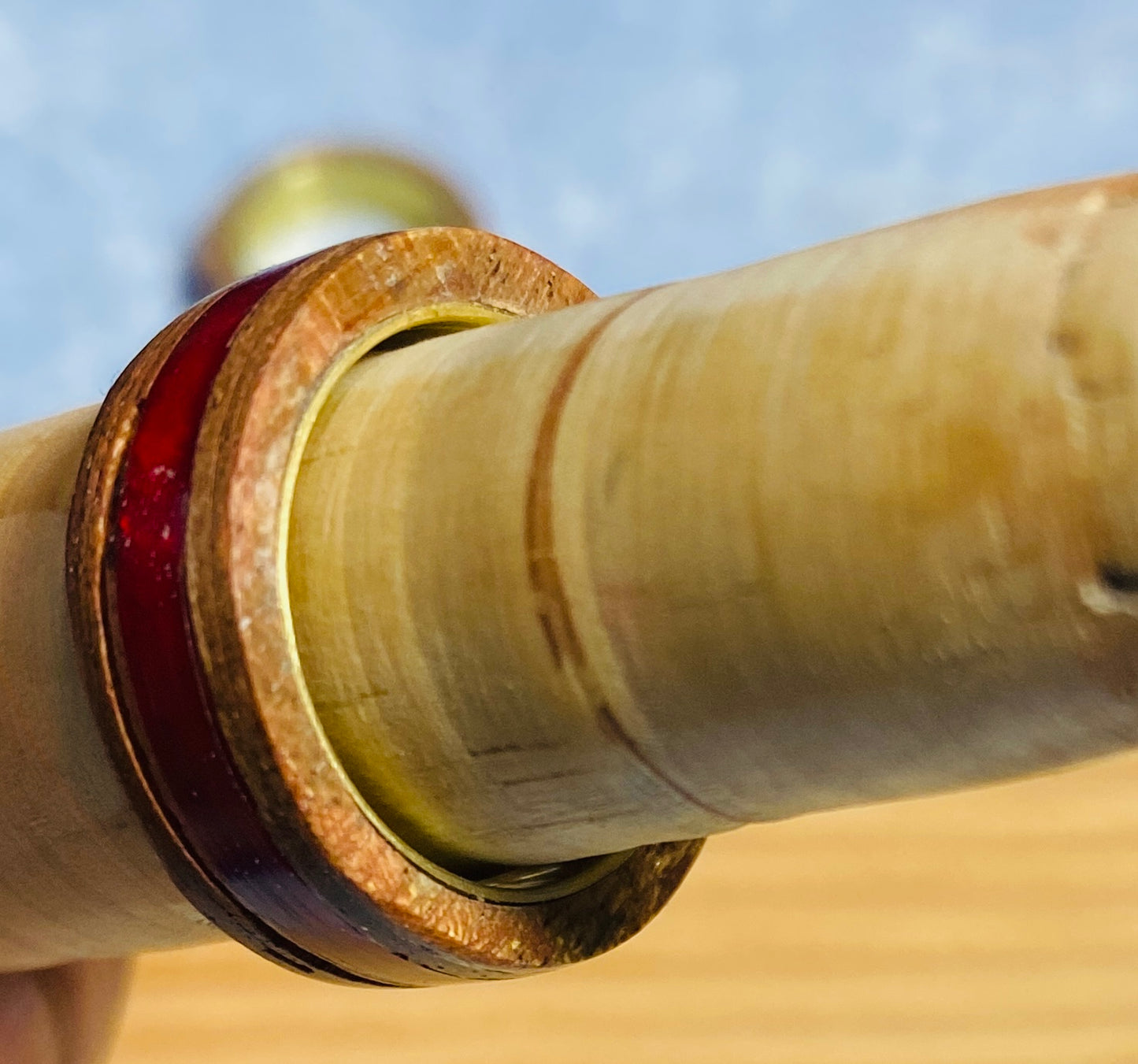 mahogany ring with red inlay