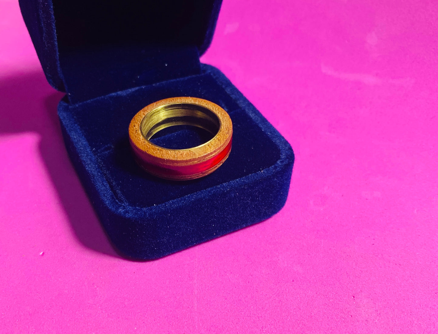 mahogany ring with red inlay