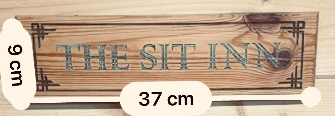 The SIT INN pub sign