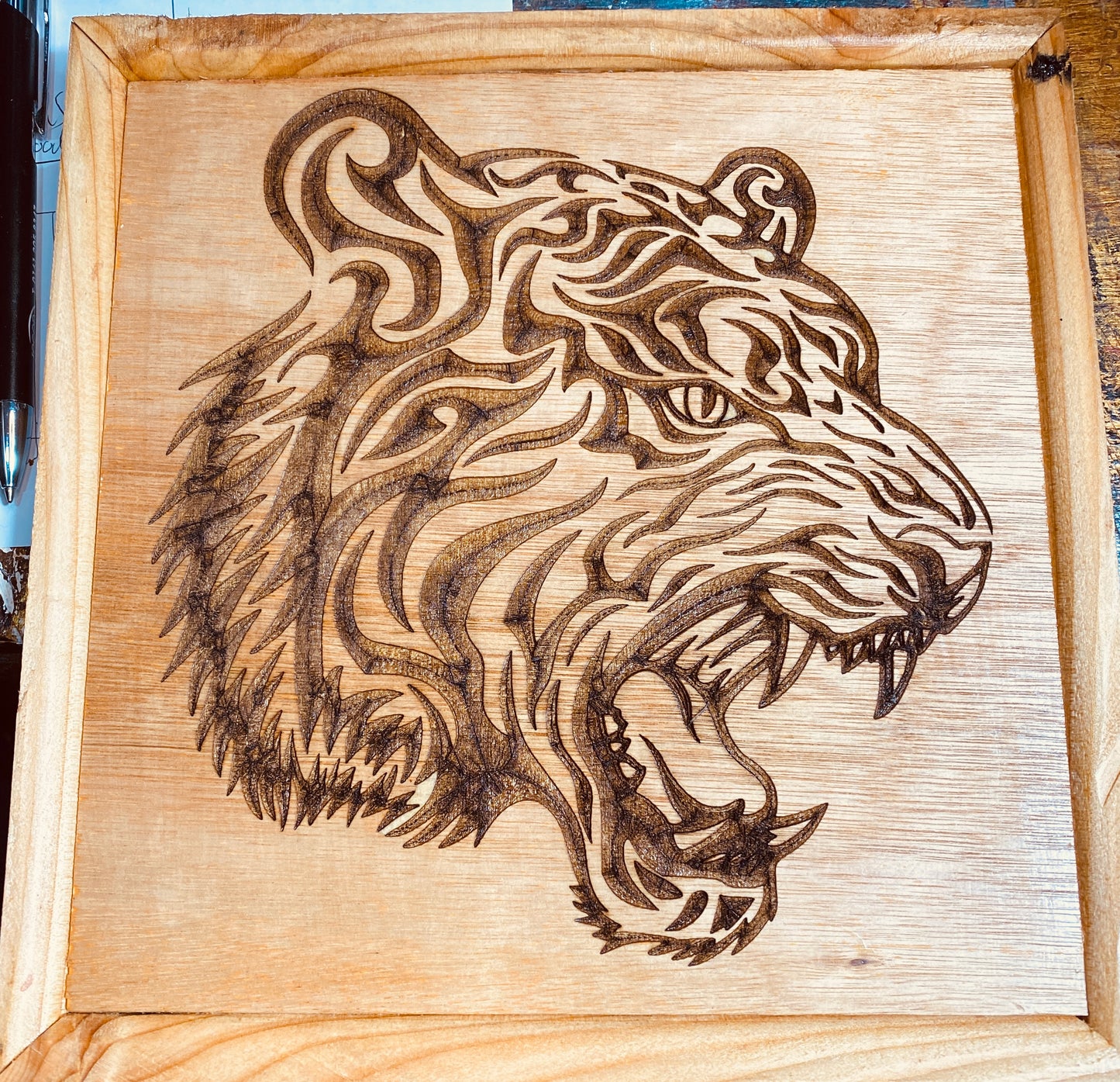Tiger head laser engraved on plywood