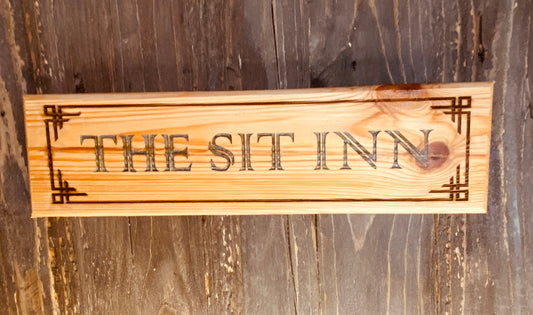 The SIT INN pub sign